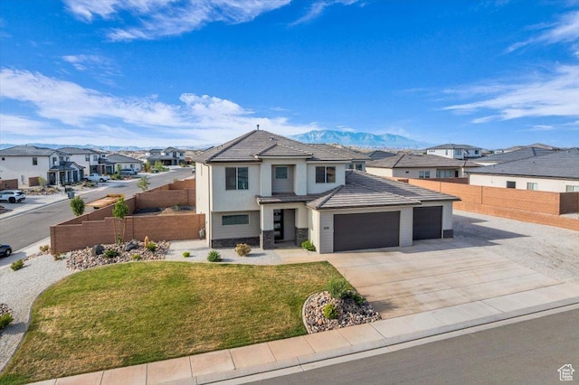 1519 E Honeycomb Dr S, St George, UT 84790 - view of front of property with a residential view, a garage, driveway, and a tiled roof