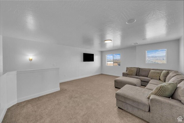 1519 E Honeycomb Dr S, St George, UT 84790 - carpeted living room featuring baseboards and a textured ceiling