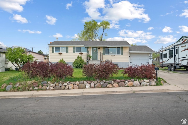 view of front of house with concrete driveway