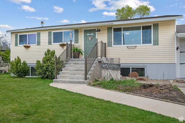 view of front of property with a front lawn