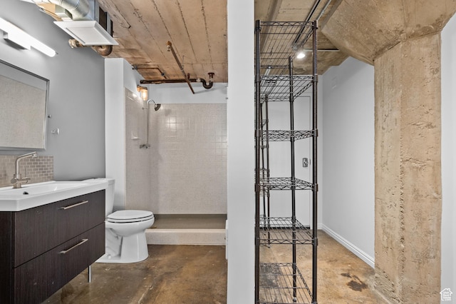 380 W 200 S Unit 104, Salt Lake City, UT 84101 - full bathroom featuring toilet, a tile shower, vanity, and unfinished concrete flooring