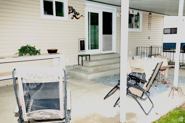 75 S Cooley St W, Grantsville, UT 84029 - view of patio featuring outdoor dining space and entry steps