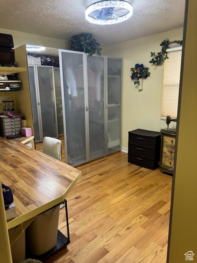 75 S Cooley St W, Grantsville, UT 84029 - office area featuring light wood-style flooring and a textured ceiling