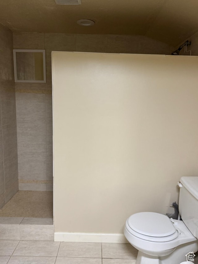 75 S Cooley St W, Grantsville, UT 84029 - full bath featuring toilet, tile patterned flooring, visible vents, and tiled shower