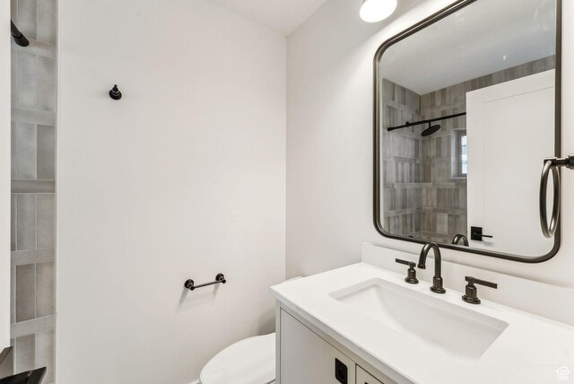 4824 N Meadow Loop Rd Unit 7, Park City, UT 84098 - bathroom featuring toilet, vanity, and tiled shower