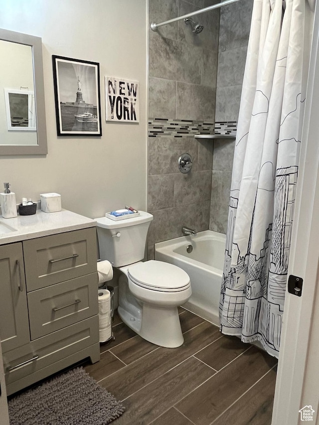 364 W Clark Cir, Farmington, UT 84025 - bathroom with toilet, wood finished floors, vanity, and shower / bathtub combination with curtain