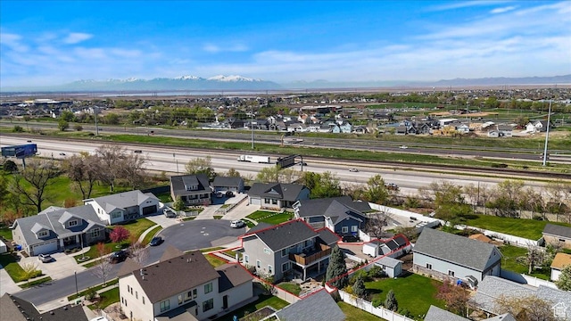 364 W Clark Cir, Farmington, UT 84025 - aerial view of residential area featuring a main thoroughfare, property boundaries highlighted, and a mountain backdrop