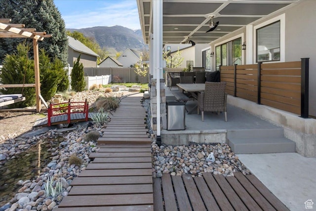 364 W Clark Cir, Farmington, UT 84025 - view of patio / terrace featuring outdoor dining area, a mountain view, and ceiling fan
