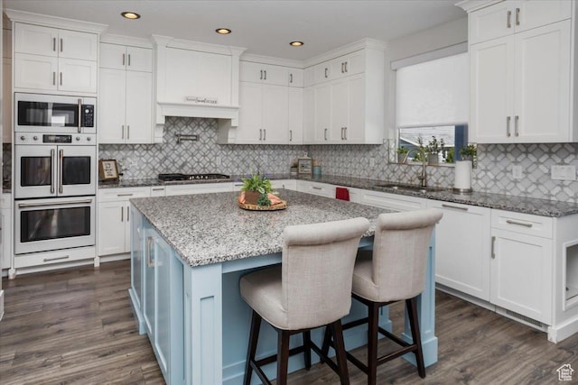 364 W Clark Cir, Farmington, UT 84025 - kitchen with a sink, stainless steel microwave, double oven, white cabinets, and recessed lighting