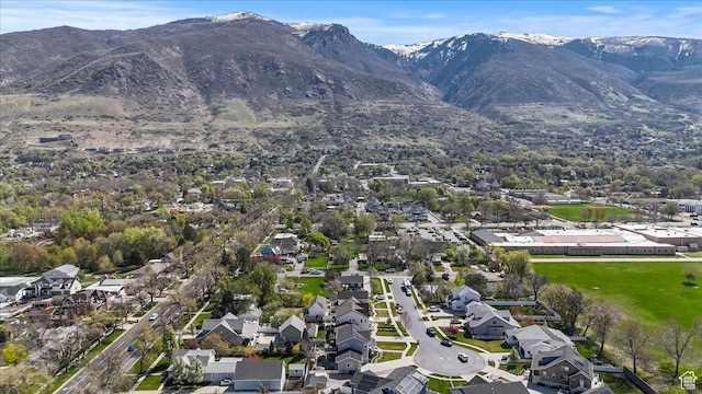 364 W Clark Cir, Farmington, UT 84025 - aerial overview of property's location with nearby suburban area and a mountain backdrop