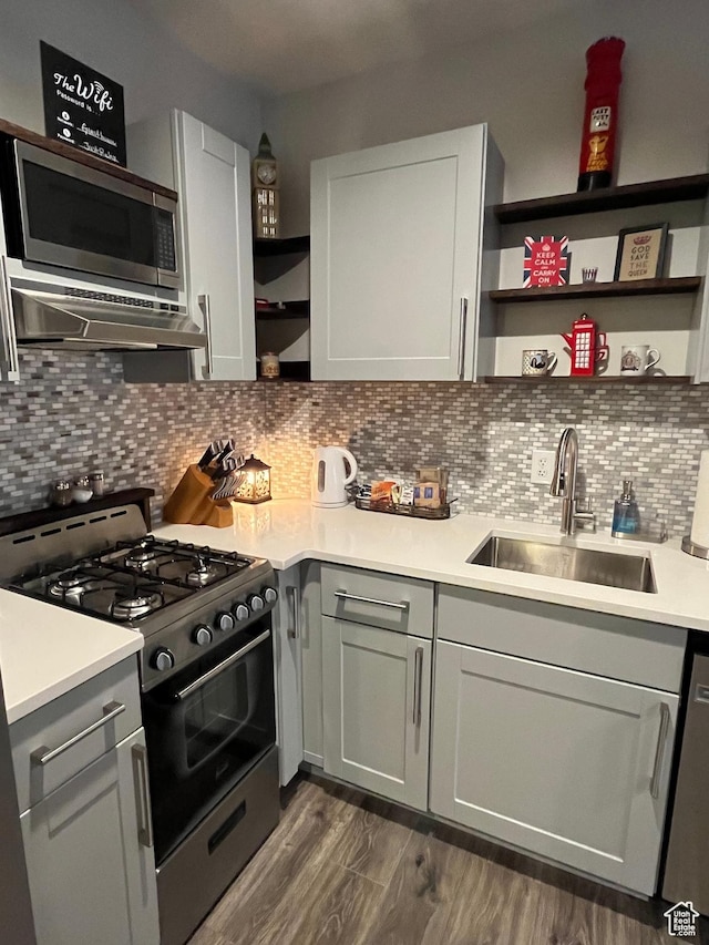 364 W Clark Cir, Farmington, UT 84025 - kitchen with range with gas stovetop, open shelves, stainless steel microwave, a sink, and range hood