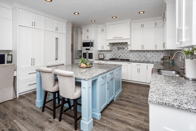 364 W Clark Cir, Farmington, UT 84025 - kitchen featuring a sink, white cabinets, custom exhaust hood, backsplash, and recessed lighting