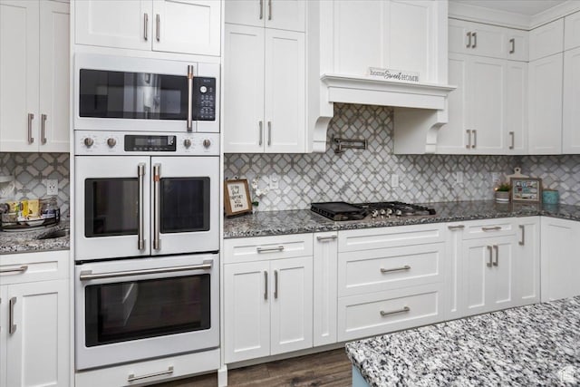364 W Clark Cir, Farmington, UT 84025 - kitchen featuring white appliances, white cabinets, decorative backsplash, and light stone countertops
