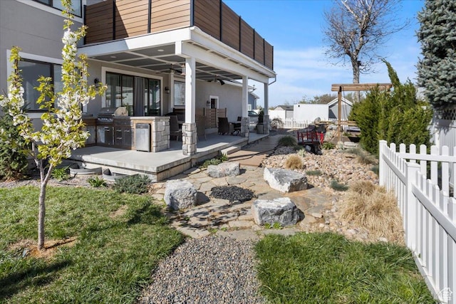 364 W Clark Cir, Farmington, UT 84025 - fenced yard featuring ceiling fan, area for grilling, a patio, and a balcony