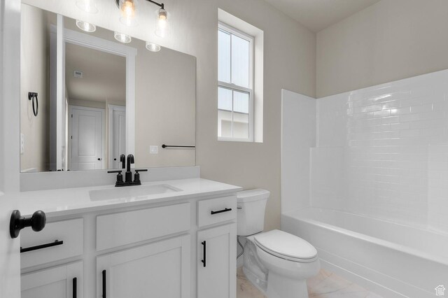 3903 W Red Clover Dr, Lehi, UT 84043 - full bathroom featuring toilet, vanity, marble finish floor, and a healthy amount of sunlight