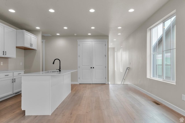3903 W Red Clover Dr, Lehi, UT 84043 - kitchen with baseboards, a sink, and recessed lighting