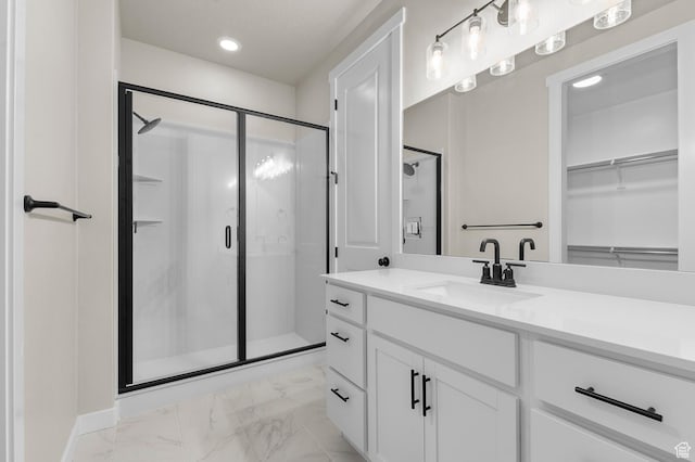 3903 W Red Clover Dr, Lehi, UT 84043 - bathroom with recessed lighting, marble finish floor, vanity, a walk in closet, and a stall shower