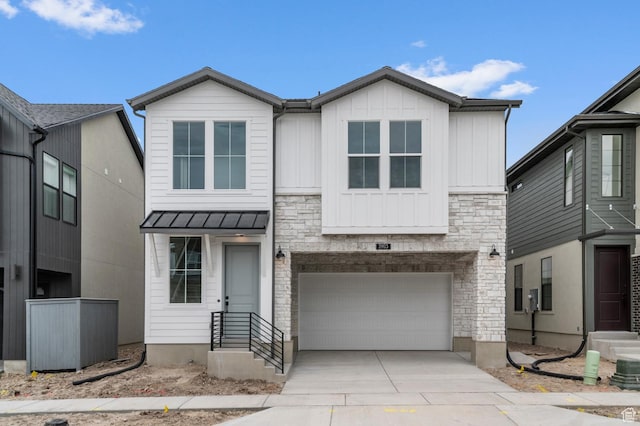 3903 W Red Clover Dr, Lehi, UT 84043 - view of front of property featuring board and batten siding, driveway, stone siding, and a garage
