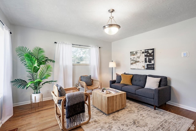 1425 W Riverside Cir, Salt Lake City, UT 84116 - living area featuring light wood-style floors and baseboards