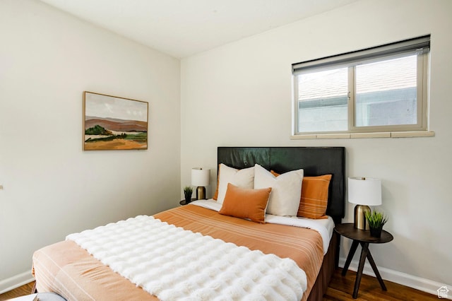 1425 W Riverside Cir, Salt Lake City, UT 84116 - bedroom featuring baseboards and wood finished floors