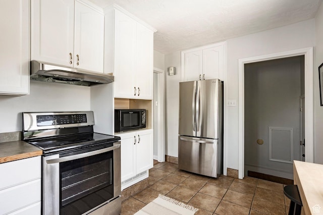 1425 W Riverside Cir, Salt Lake City, UT 84116 - kitchen with stainless steel appliances, under cabinet range hood, white cabinetry, and tile patterned floors