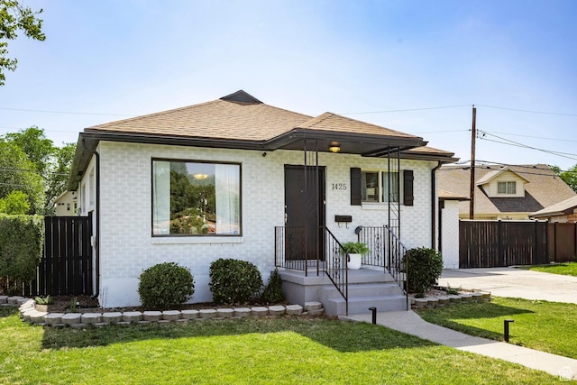 1425 W Riverside Cir, Salt Lake City, UT 84116 - view of front of home with brick siding and roof with shingles