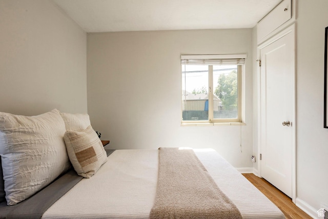 1425 W Riverside Cir, Salt Lake City, UT 84116 - bedroom with light wood-style floors and baseboards