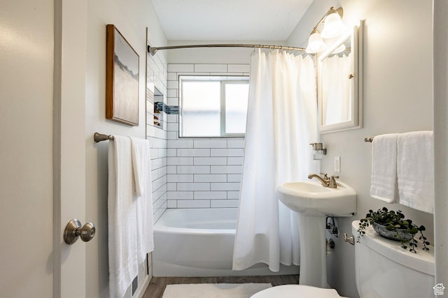 1425 W Riverside Cir, Salt Lake City, UT 84116 - bathroom featuring toilet and shower / bath combo with shower curtain