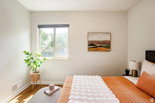 1425 W Riverside Cir, Salt Lake City, UT 84116 - bedroom featuring wood finished floors and baseboards