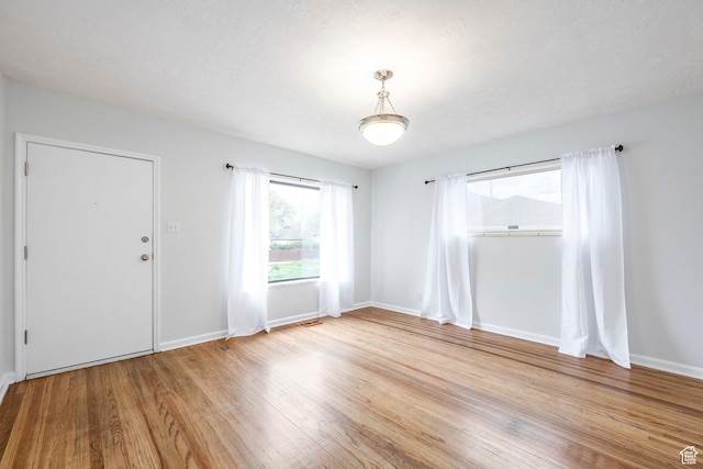 1425 W Riverside Cir, Salt Lake City, UT 84116 - spare room with light wood-style floors and baseboards