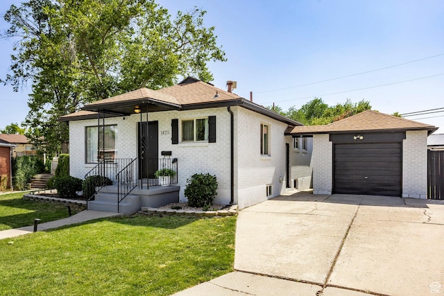 1425 W Riverside Cir, Salt Lake City, UT 84116 - view of front of house featuring driveway, a front lawn, brick siding, and a chimney