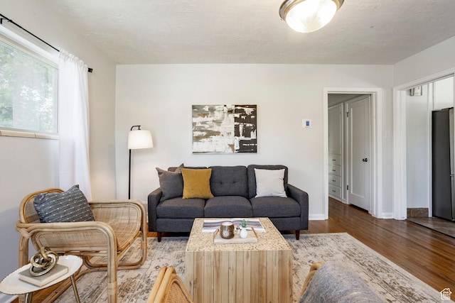 1425 W Riverside Cir, Salt Lake City, UT 84116 - living area featuring wood finished floors and baseboards