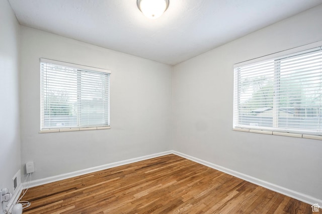 1425 W Riverside Cir, Salt Lake City, UT 84116 - empty room featuring baseboards and wood finished floors