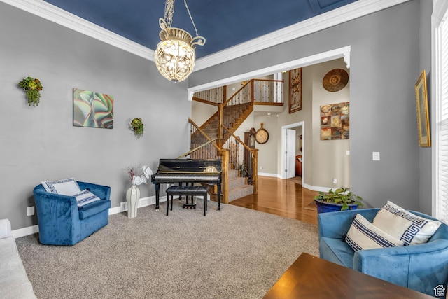 3627 W Augusta Dr, Syracuse, UT 84075 - sitting room with stairs, a chandelier, baseboards, carpet flooring, and ornamental molding