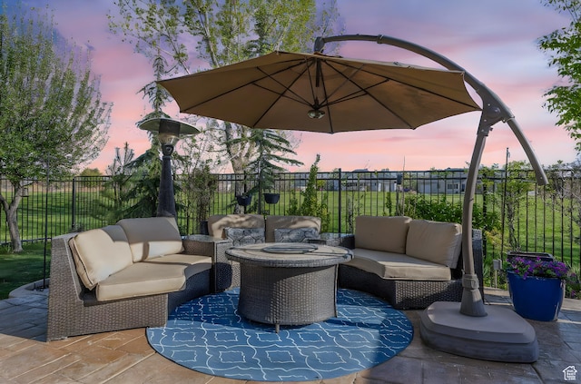 3627 W Augusta Dr, Syracuse, UT 84075 - patio terrace at dusk with an outdoor hangout area and a patio area