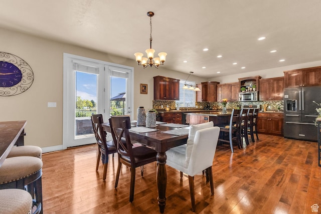 3627 W Augusta Dr, Syracuse, UT 84075 - dining room featuring a chandelier, recessed lighting, dark wood finished floors, french doors, and baseboards