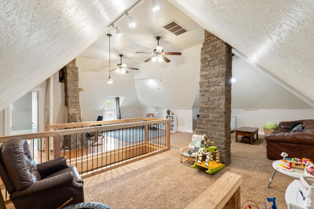290 N 300 E, Springville, UT 84663 - living area with vaulted ceiling, visible vents, and a textured ceiling