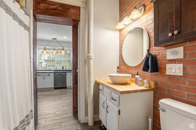 290 N 300 E, Springville, UT 84663 - bathroom with wood finished floors, toilet, and vanity