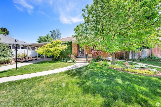 obstructed view of property featuring brick siding