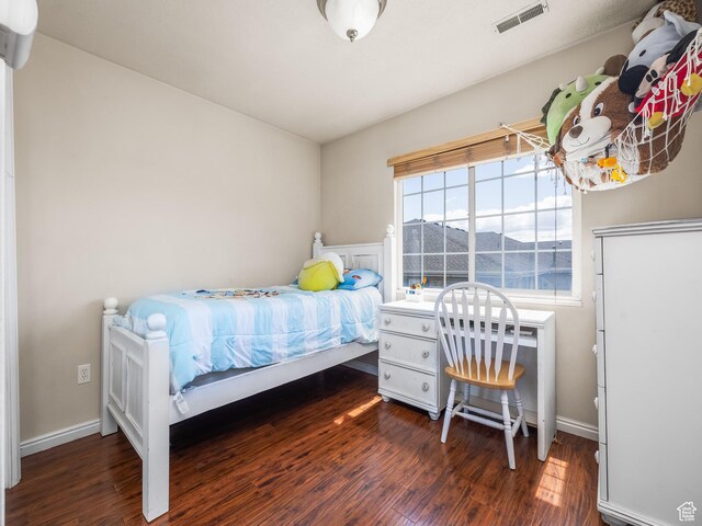 112 W Cougar Blvd N Unit 311, Provo, UT 84604 - bedroom with visible vents, baseboards, and wood finished floors