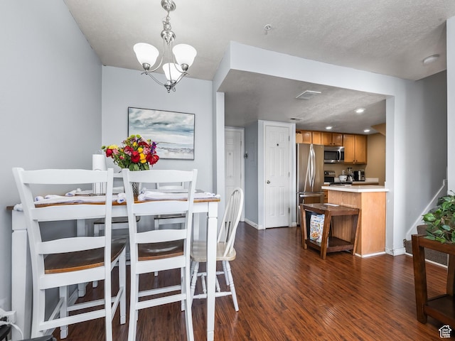 112 W Cougar Blvd N Unit 311, Provo, UT 84604 - dining room with baseboards, dark wood finished floors, an inviting chandelier, and visible vents