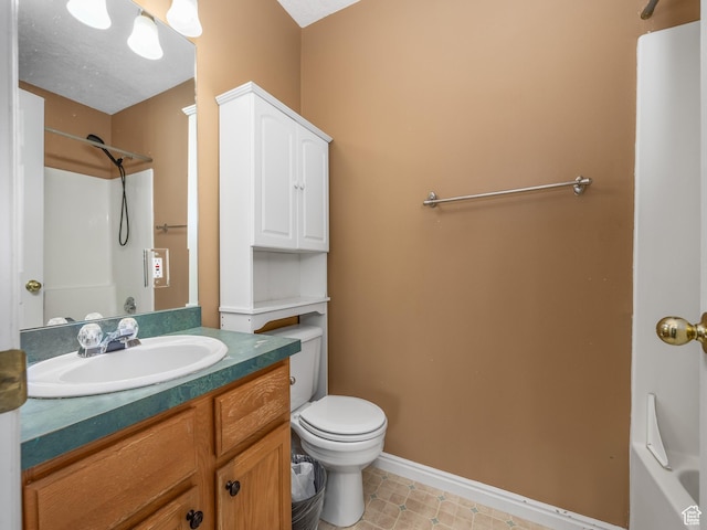 112 W Cougar Blvd N Unit 311, Provo, UT 84604 - full bathroom featuring baseboards, a shower, toilet, and vanity