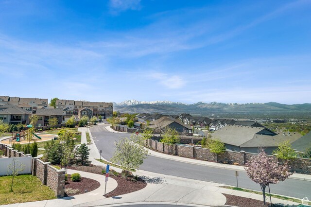 exterior space featuring a mountain view and a residential view