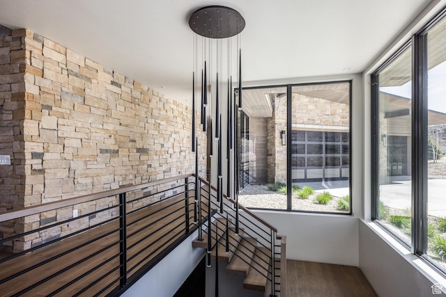stairs with wood finished floors