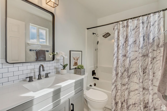 bathroom with shower / tub combo with curtain, toilet, vanity, and decorative backsplash