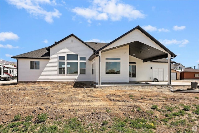 2649 N 3975 W, Plain City, UT 84404 - rear view of property with a patio area and a shingled roof