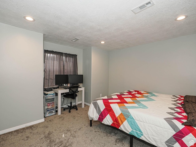 bedroom featuring a textured ceiling, carpet floors, baseboards, visible vents, and recessed lighting