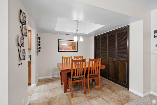 612 E 3990 S, Murray, UT 84107 - dining area featuring a tray ceiling, visible vents, and baseboards