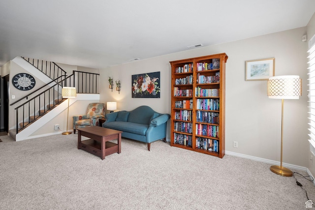 612 E 3990 S, Murray, UT 84107 - carpeted living area with stairway, visible vents, and baseboards