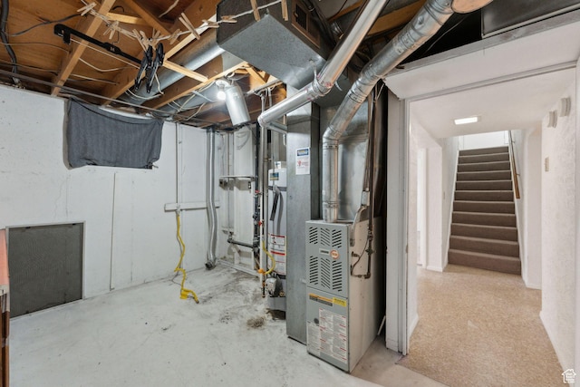 unfinished basement with heating unit and stairway